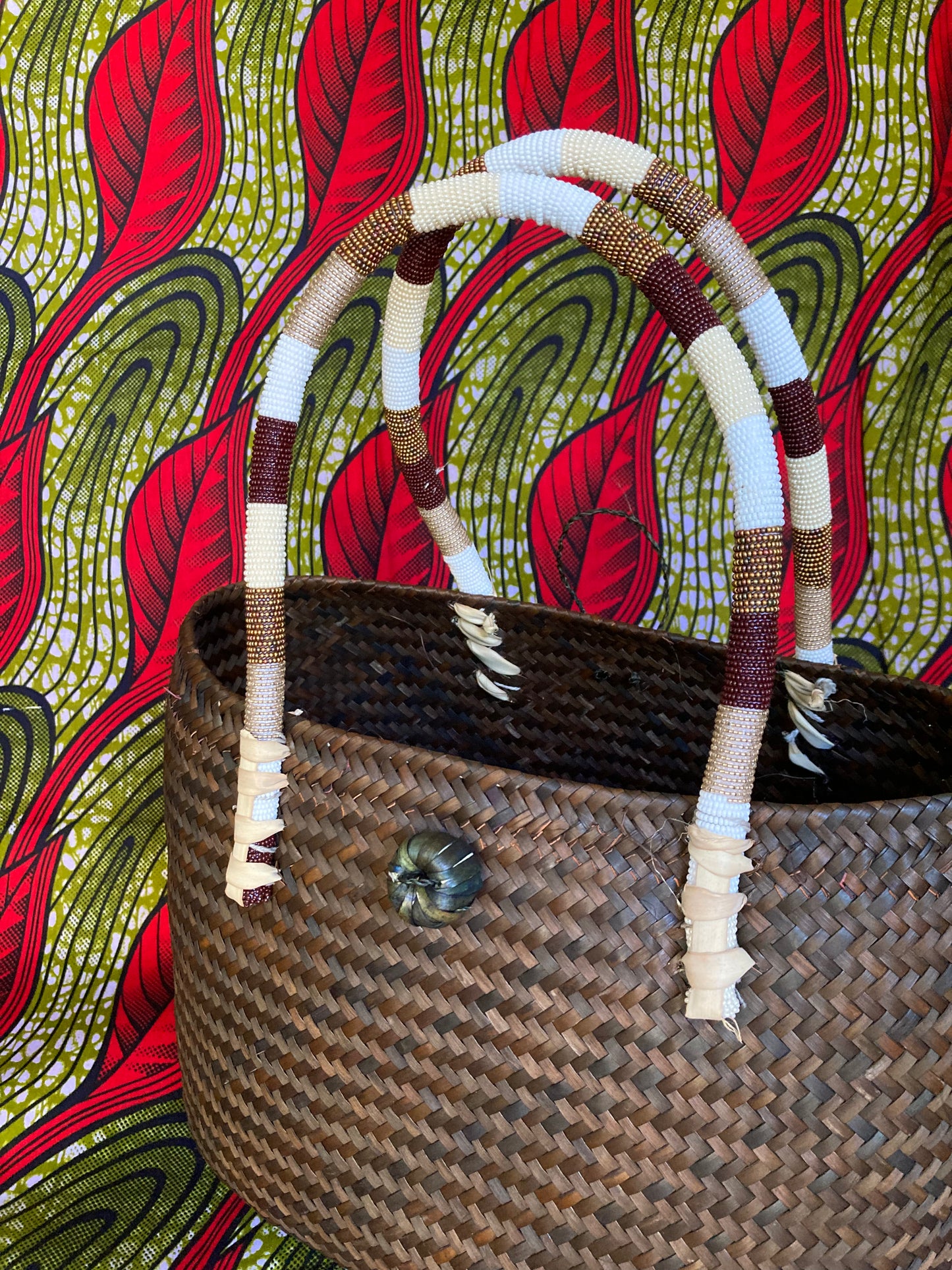 1-Brown Tub basket with beaded striped handles