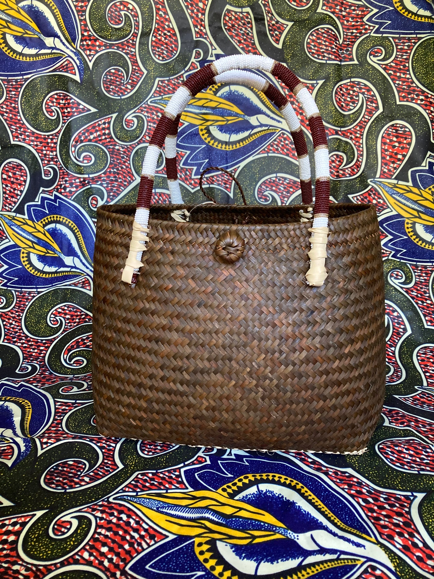 1-Brown Tub basket with beaded striped handles