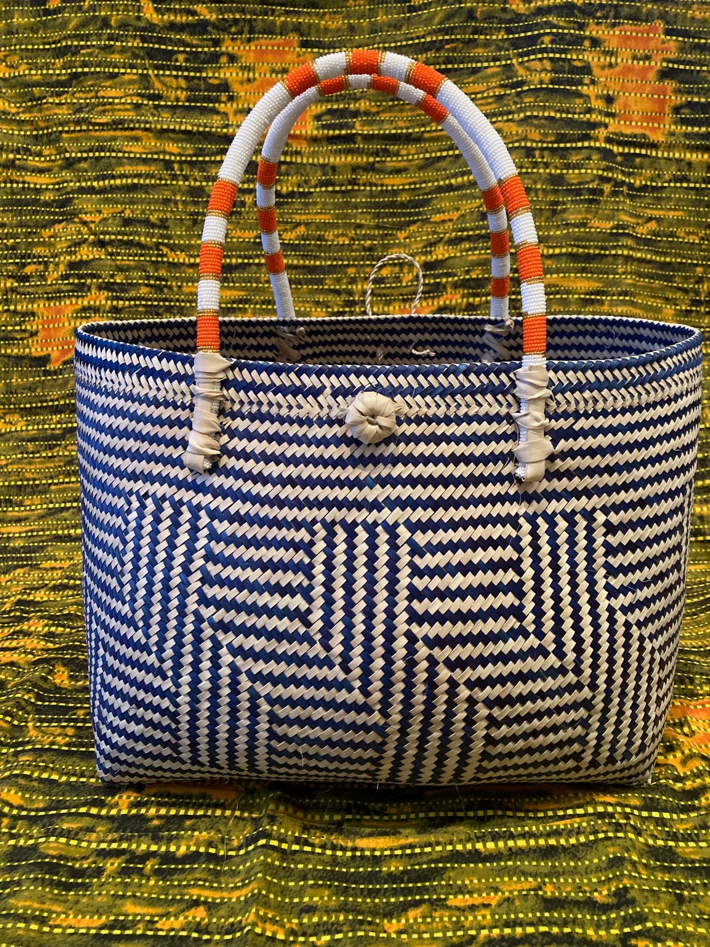 2-tone orange stripe beaded handle basket