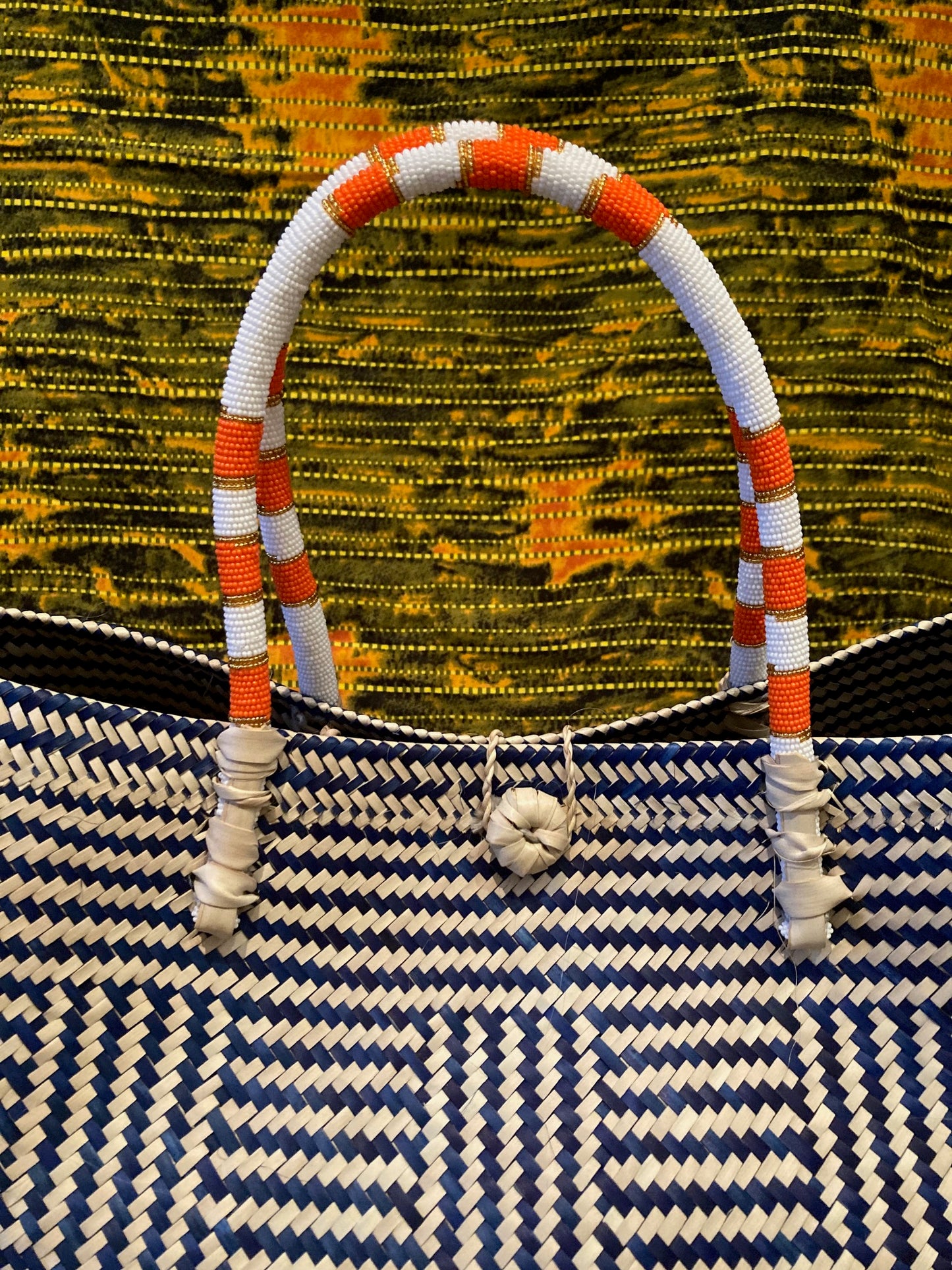 2-tone orange stripe beaded handle basket